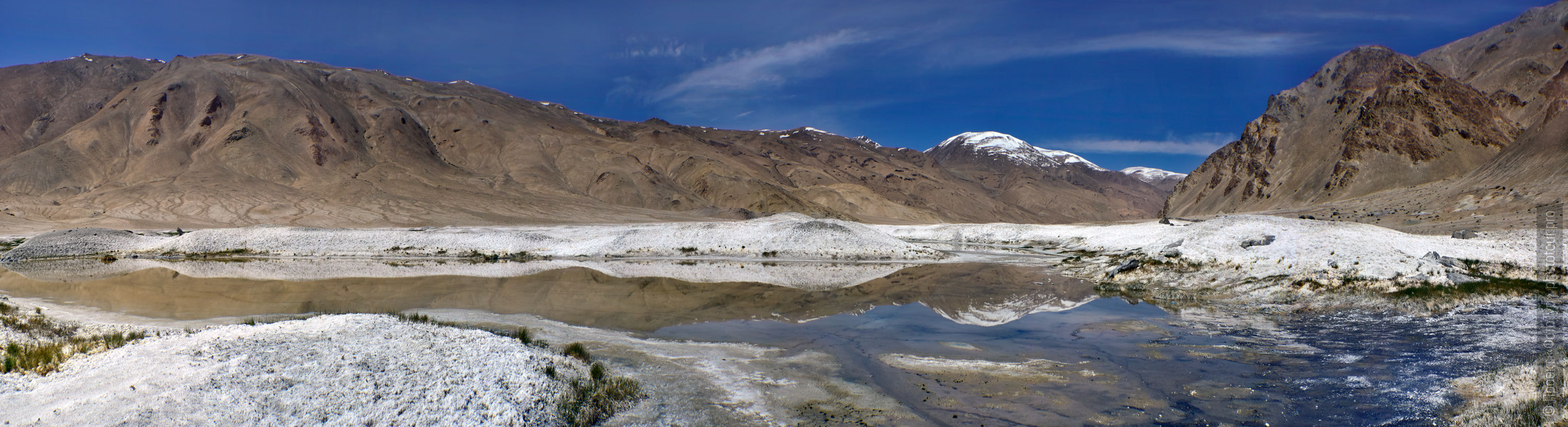 High mountain valley of geysers between lakes Tso Moriri and Tso Kar. Expedition Tibet Lake-2: Pangong, Tso Moriri, Tso Kar, Tso Startsapak, Leh-Manali highway.