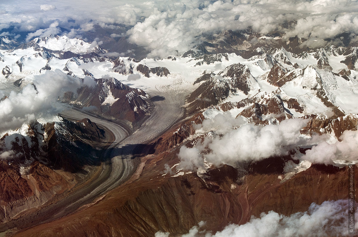 Ladakh from the height of the flight: Himalayan Range, Small Tibet, India. Tour Origins of Tibet: Bon, true Aryans to Da Khan, Mystery Dance Tsam in Lamayuru, Lake Pangong, June 15 - 26, 2020. Tour to Ladakh.